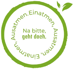 In einem grünen Kreis steht der Text: Einatmen, Ausatmen, Einatmen, Ausatmen. Na bitte, geht doch!